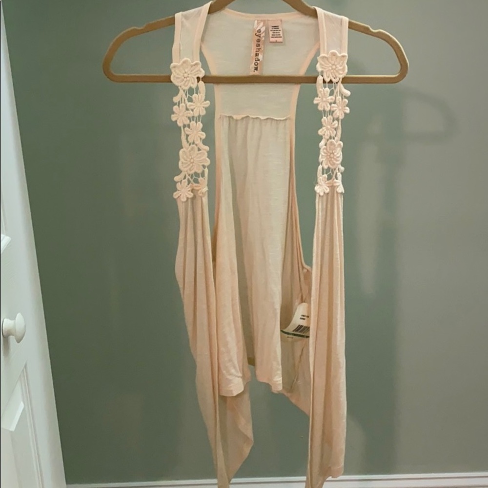 Flowy floral detail over vest